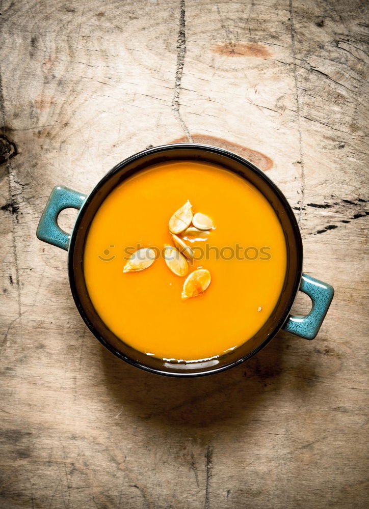 Similar – Image, Stock Photo Citrus juice in a glass on a dark table