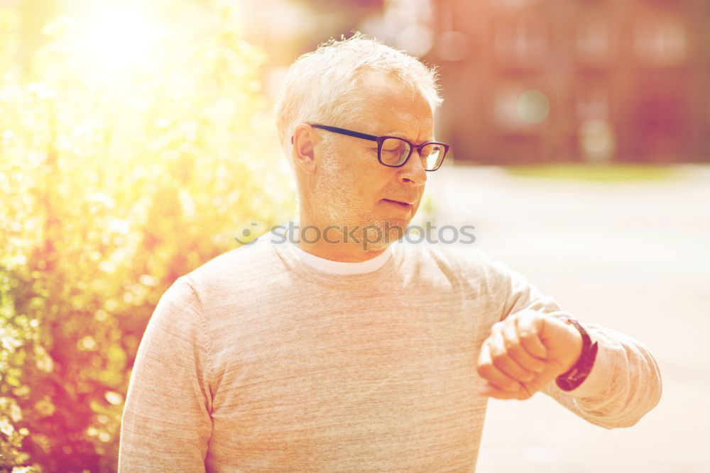 Similar – Image, Stock Photo Portrait of a senior man using a smart watch.