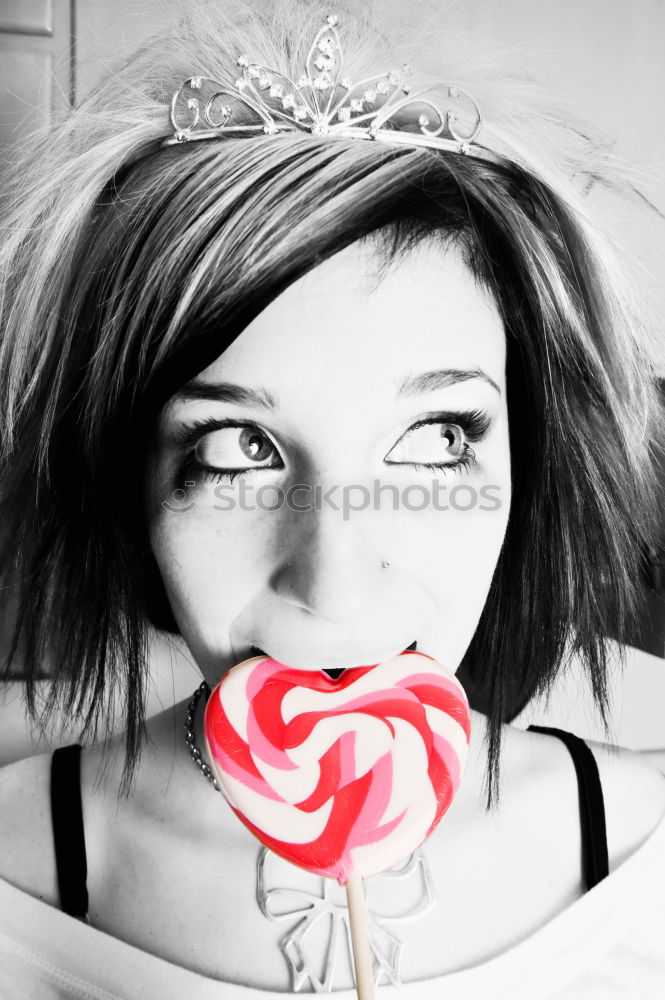 Similar – Image, Stock Photo Young woman holding colorful lollipops