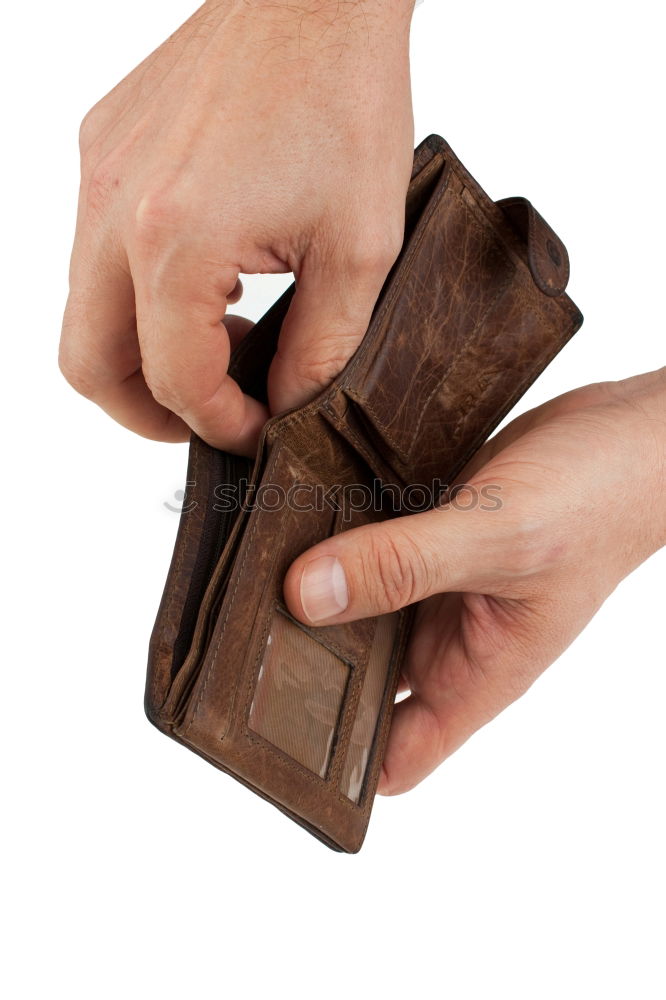 Similar – two female hands hold brown leather open empty wallet for cash