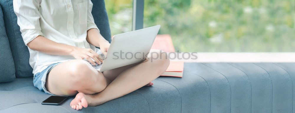 Similar – Young woman reading in her room