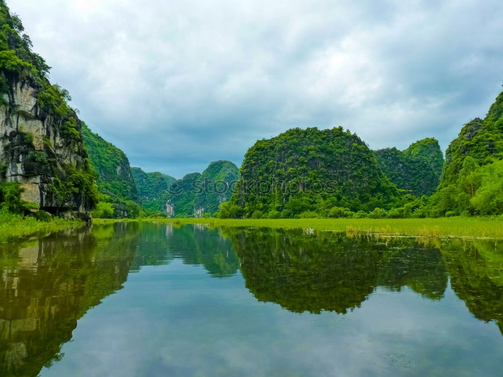 Similar – Image, Stock Photo Landscape Vietnam. River view in the dim light of dusk at Ninhbinh, Tam Coc, Vietnam