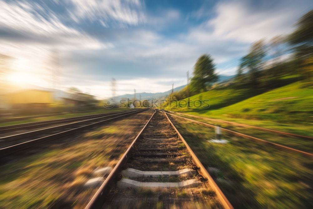 Similar – Image, Stock Photo High-speed train moving through nature at sunset