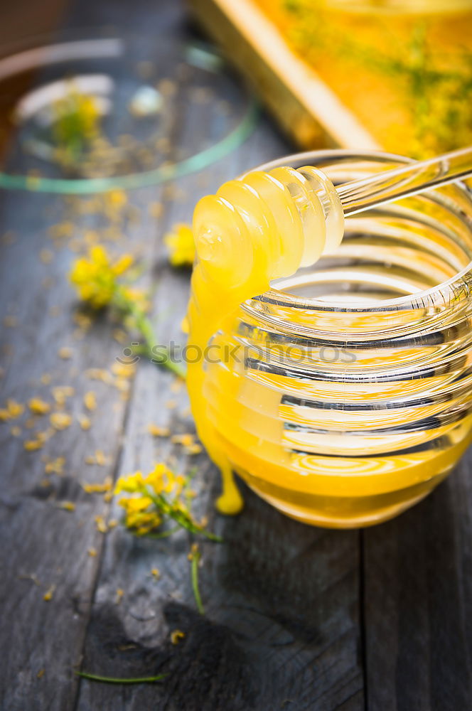 Similar – Image, Stock Photo Fresh honey in glass containers