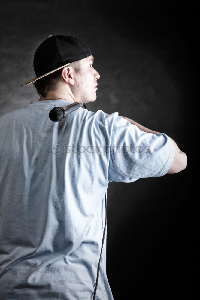 Similar – Man posing at the brick wall