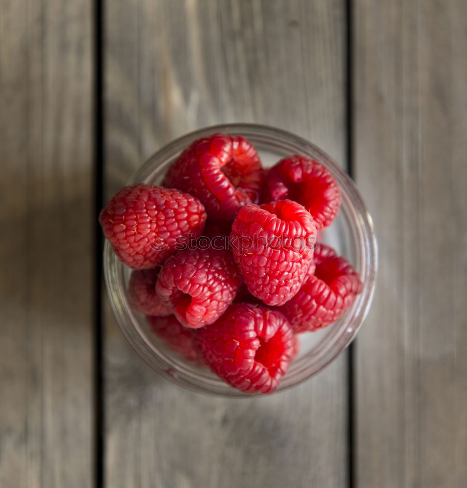 Similar – Fresh yogurt with fruits and muesli on breakfast