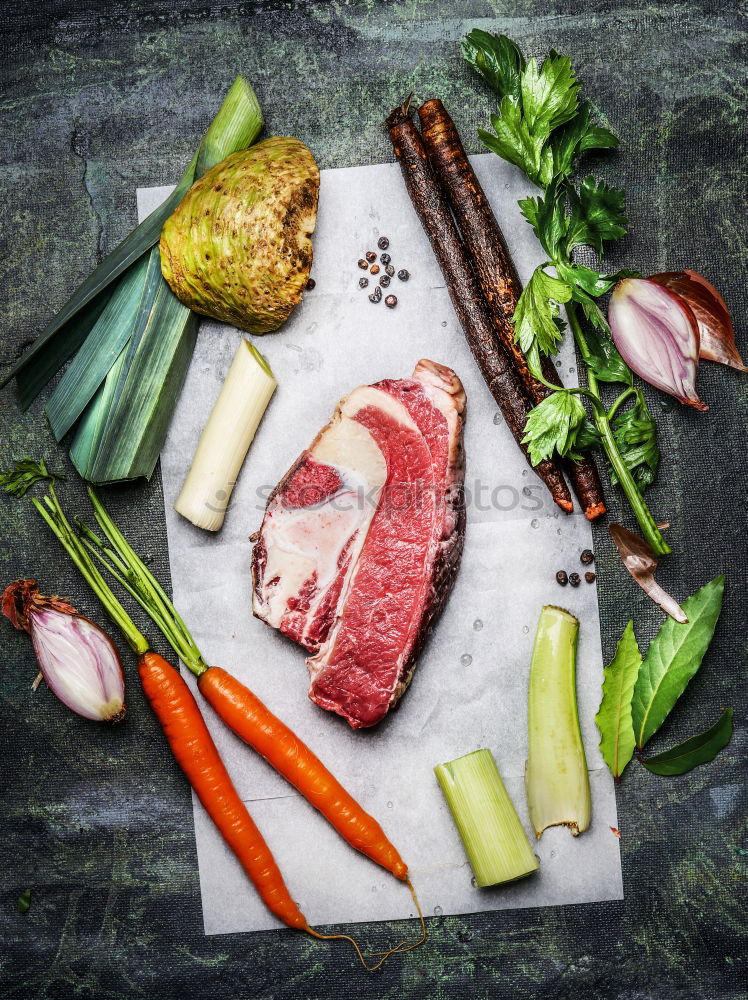 Similar – Grill steak ingredients around empty table.