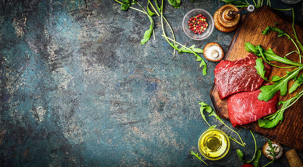 Similar – Image, Stock Photo Racks of lamb and green peas, preparation with cooking ingredients