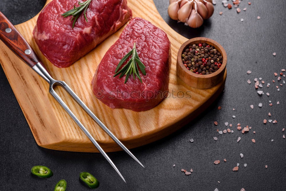 Similar – raw beef steak in spices