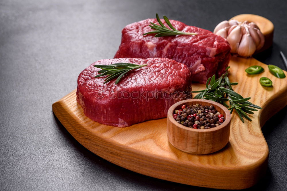 Similar – Image, Stock Photo Organic meat with herbs, butter and spices