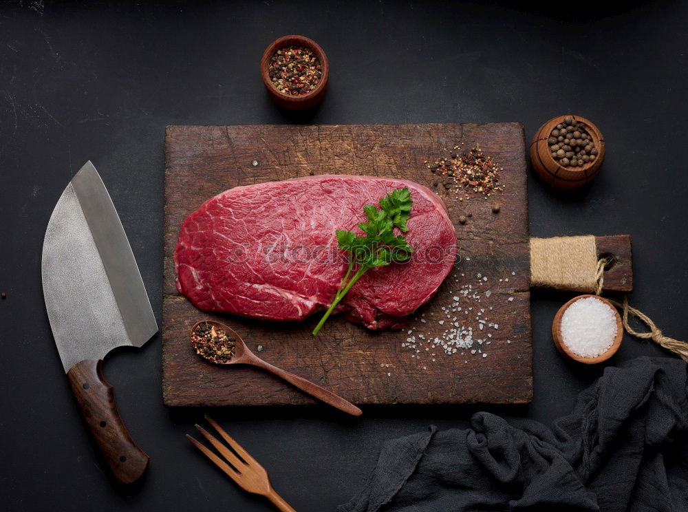Similar – Image, Stock Photo Marbled steaks on the kitchen table