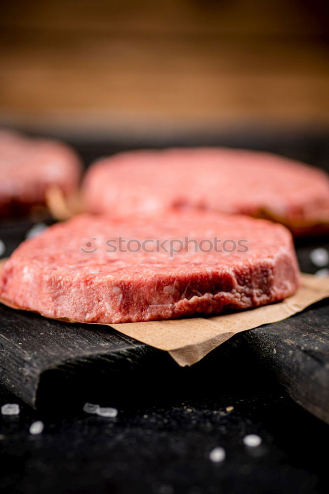 Similar – Image, Stock Photo Schnitzel meat on a rustic wooden table