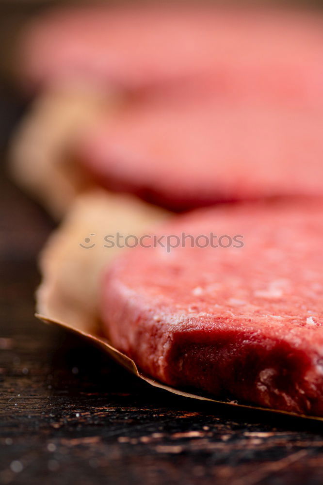 Similar – Image, Stock Photo Schnitzel meat on a rustic wooden table