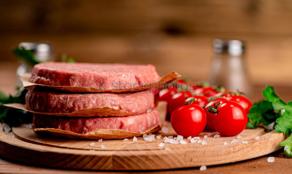 Similar – Image, Stock Photo Beef, vegetable ingredients, kitchen knife and saucepan