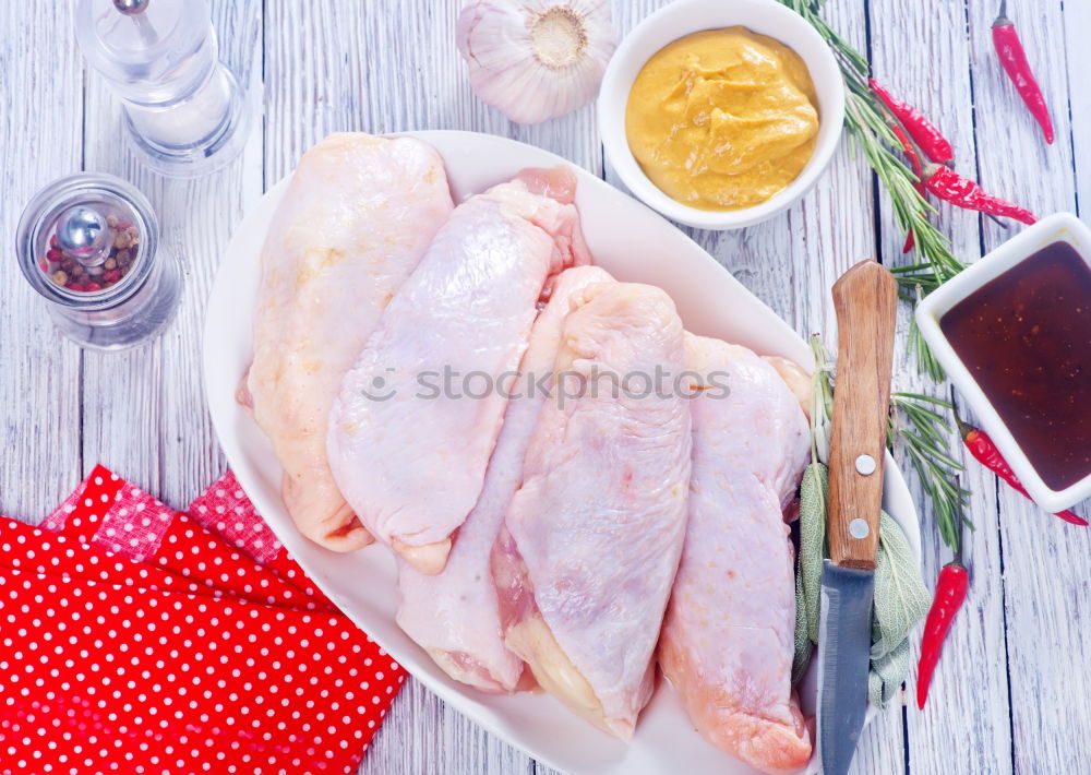 Similar – Chicken thigh with olive oil, honey, herbs and lemon