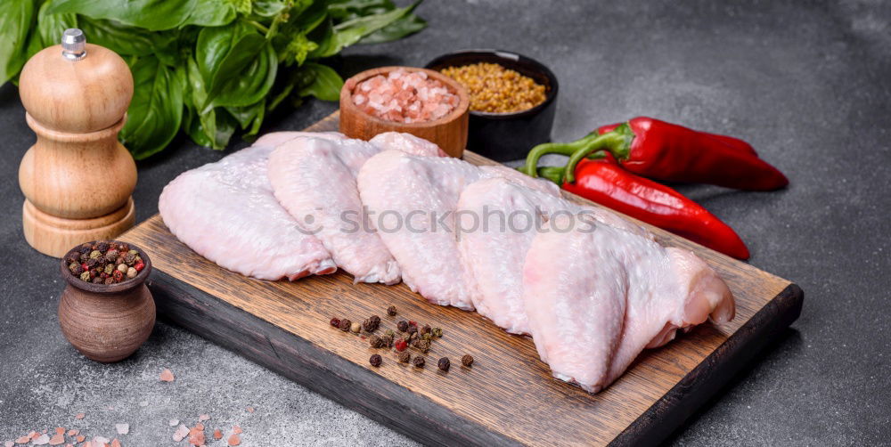 Similar – Image, Stock Photo marinate chicken thighs spicy