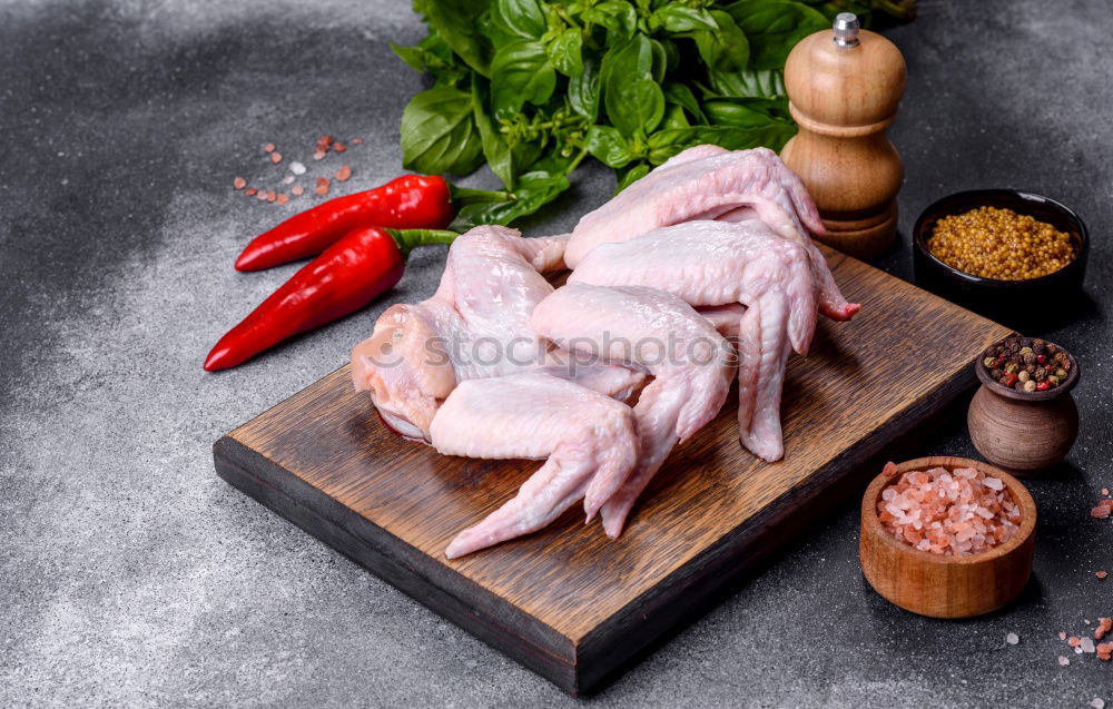Similar – Image, Stock Photo marinate chicken thighs spicy