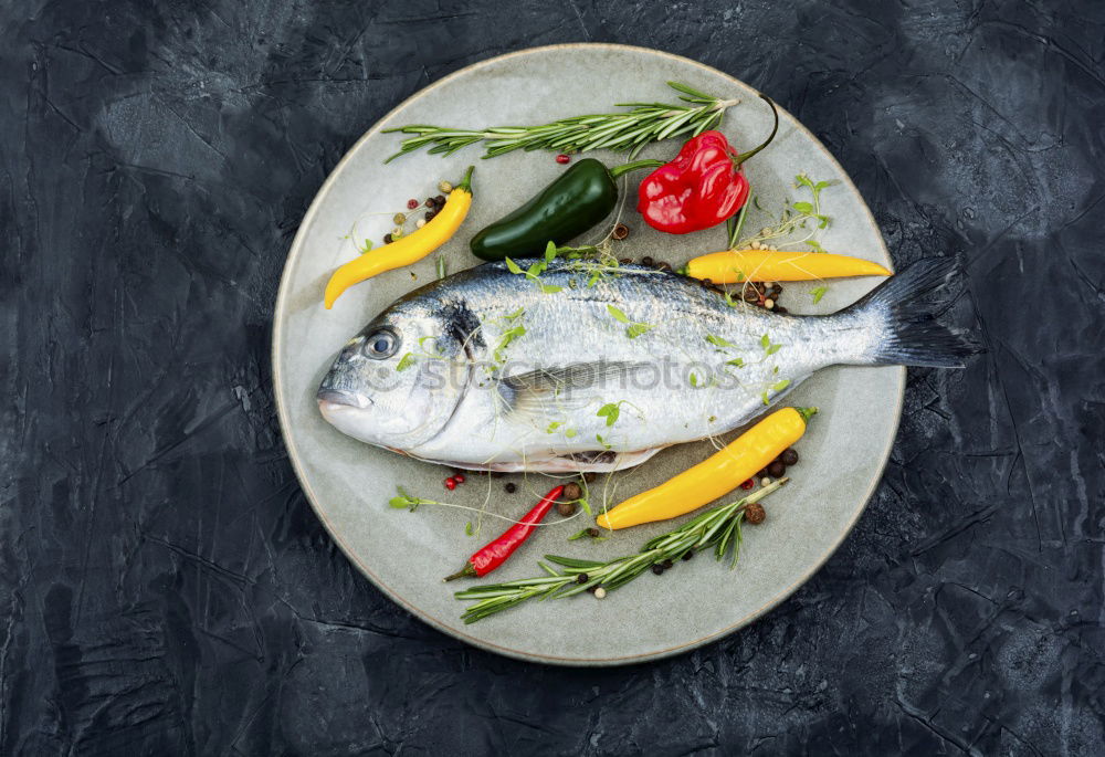 Similar – Fish fillet preparation with vegetables, fennel seeds and spices