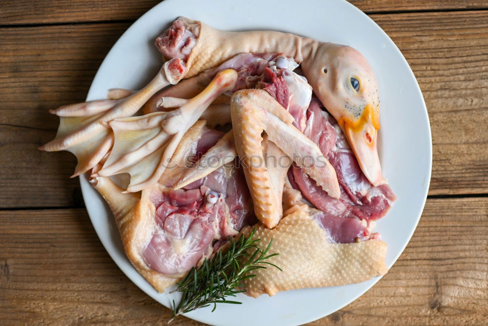 Similar – Image, Stock Photo Raw chicken legs with mushrooms, spices and herbs