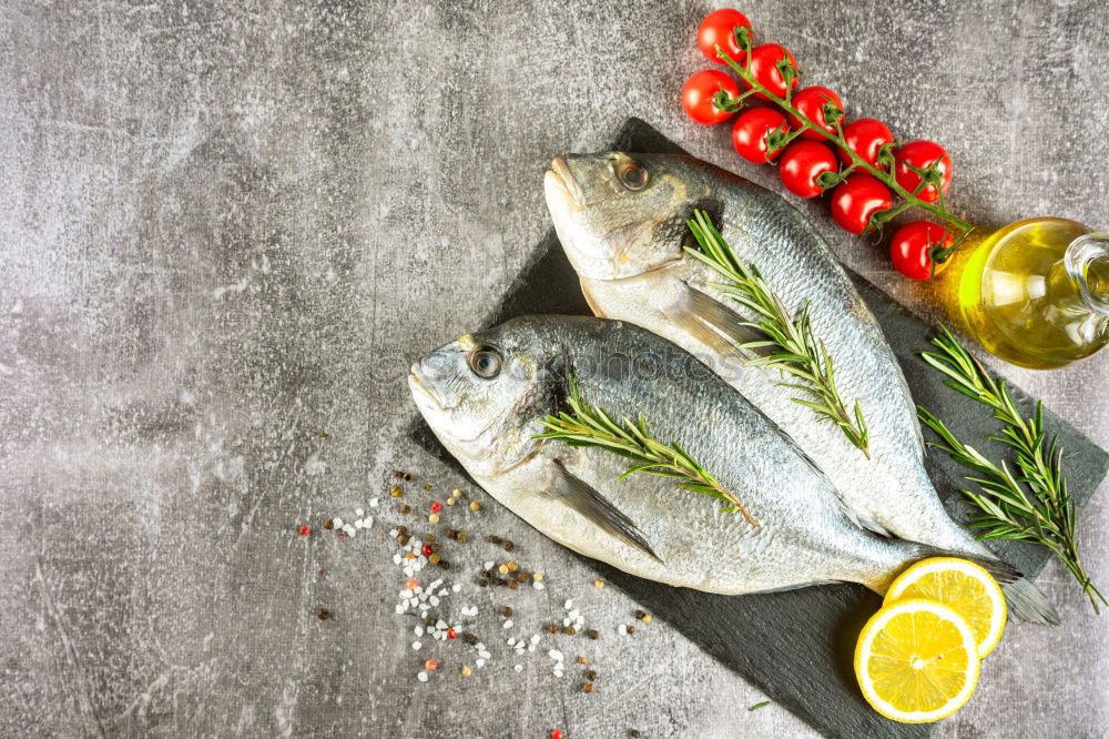 Similar – Image, Stock Photo Raw salmon fish in ice and vegetables