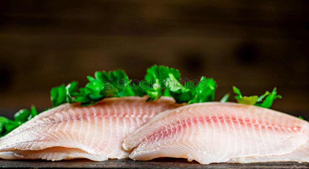 Similar – Fish fillet preparation on the baking tray