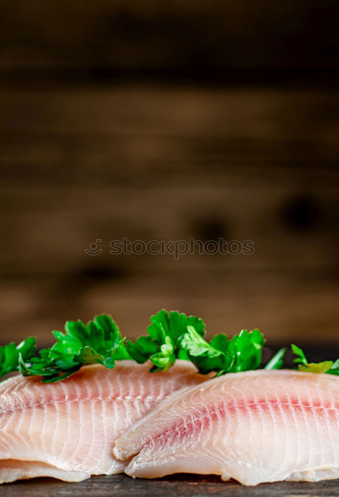 Similar – Fish fillet preparation on the baking tray