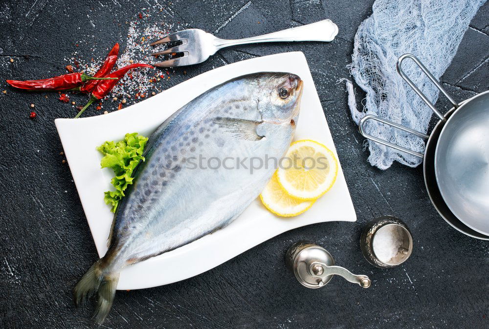 Similar – Image, Stock Photo Fish fillets with kitchen knife and spices