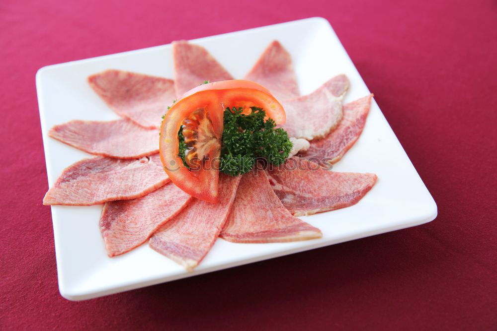 Similar – Homemade breakfast: bread with ham, onions, radish