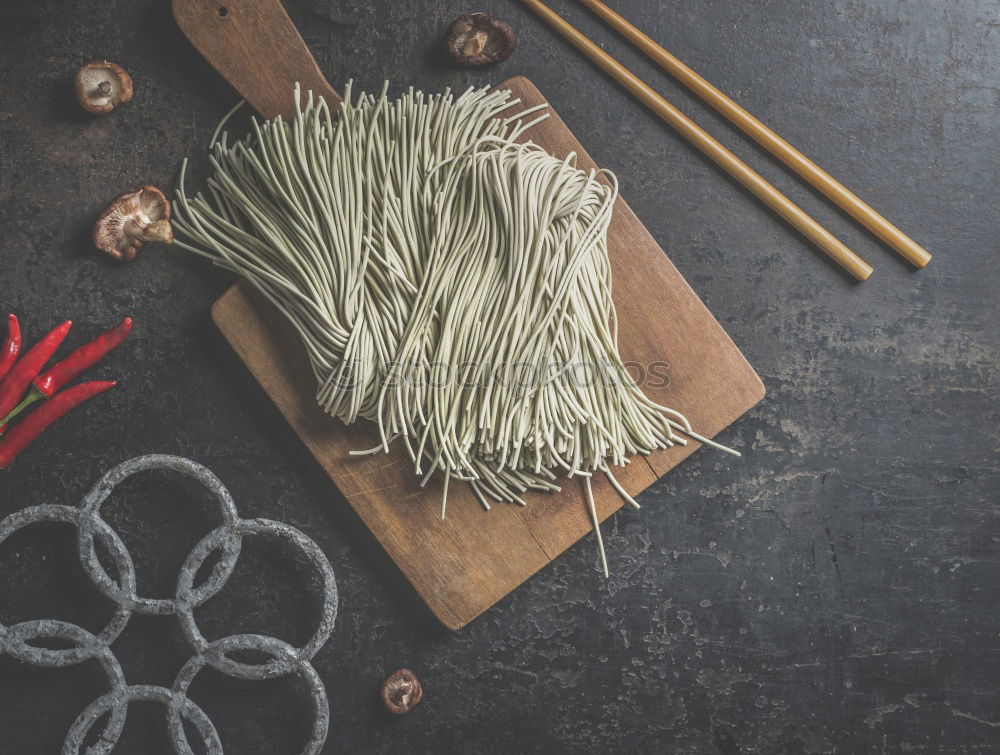 Similar – Image, Stock Photo Herbs sage tea on pile of books and old scissors