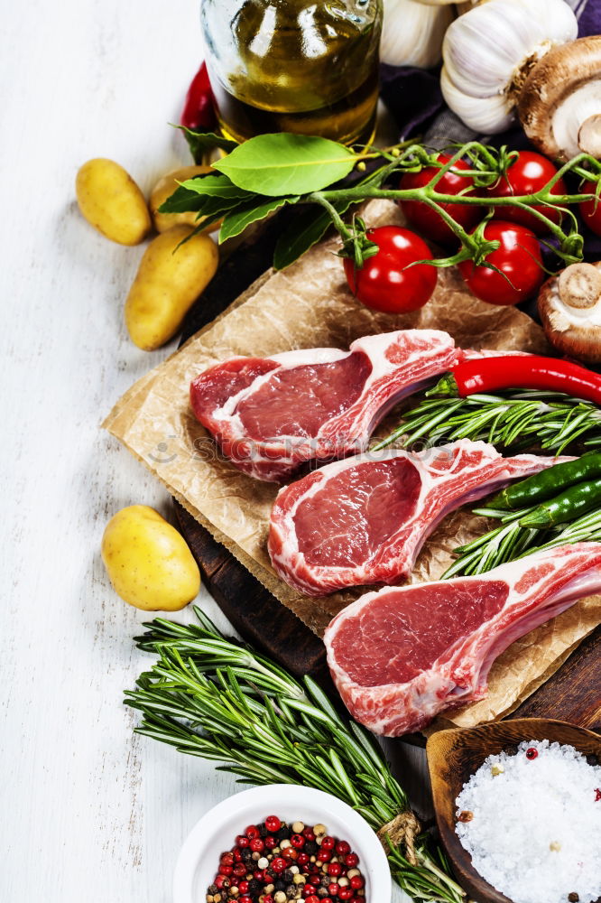 Similar – Image, Stock Photo Empty plates with lamb chop preparation