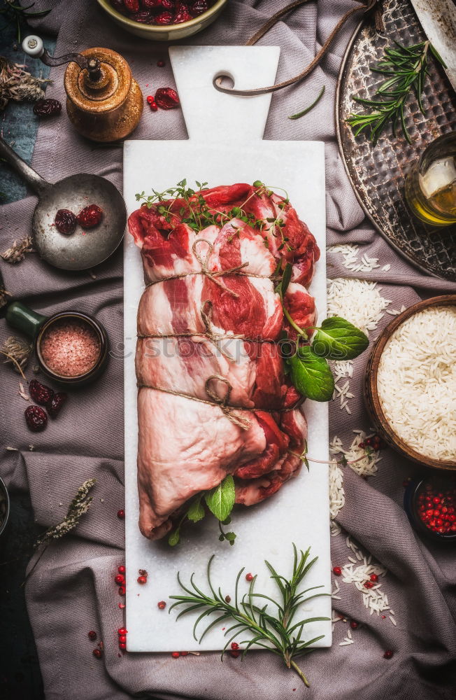 Similar – Image, Stock Photo Venison ham with nut bread served on tree bark