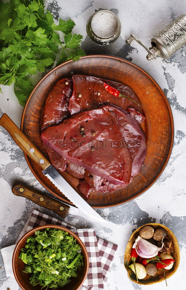 Similar – Image, Stock Photo Beef, vegetable ingredients, kitchen knife and saucepan