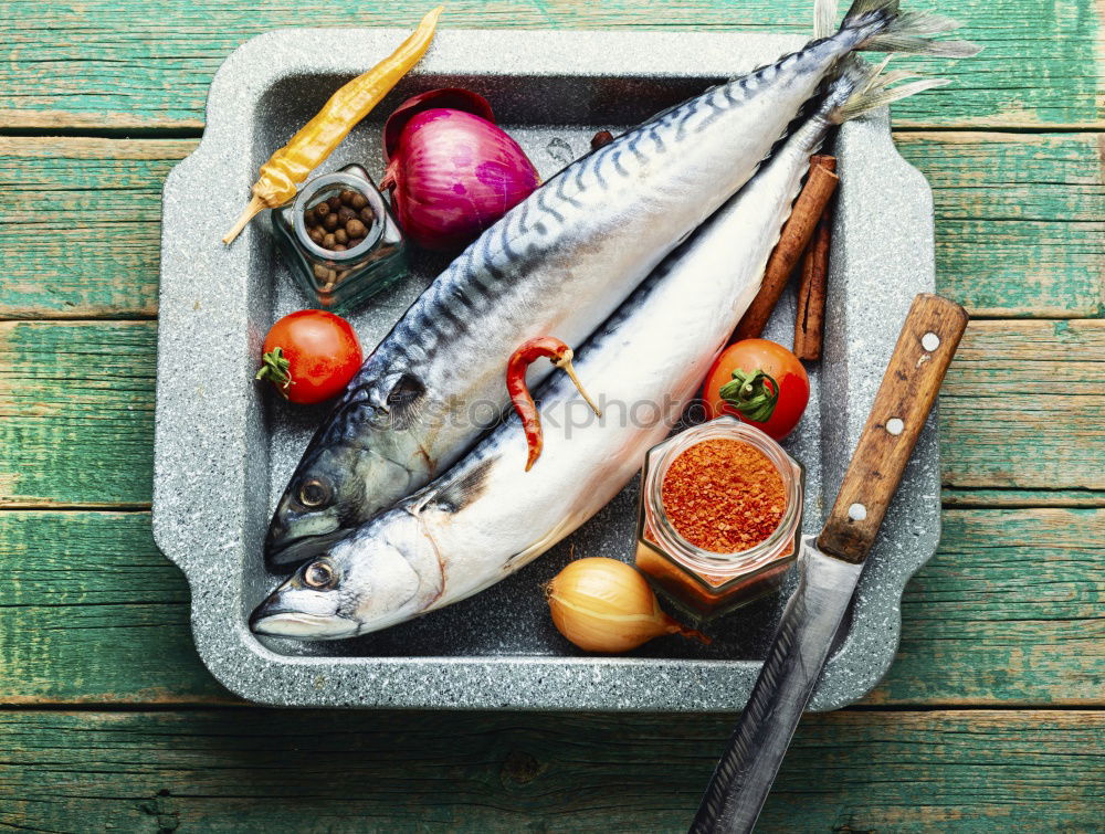 Similar – Fish fillet preparation with vegetables, fennel seeds and spices