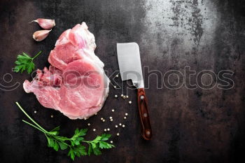 Similar – Image, Stock Photo Lamb Racks on kitchen table with green ingredients