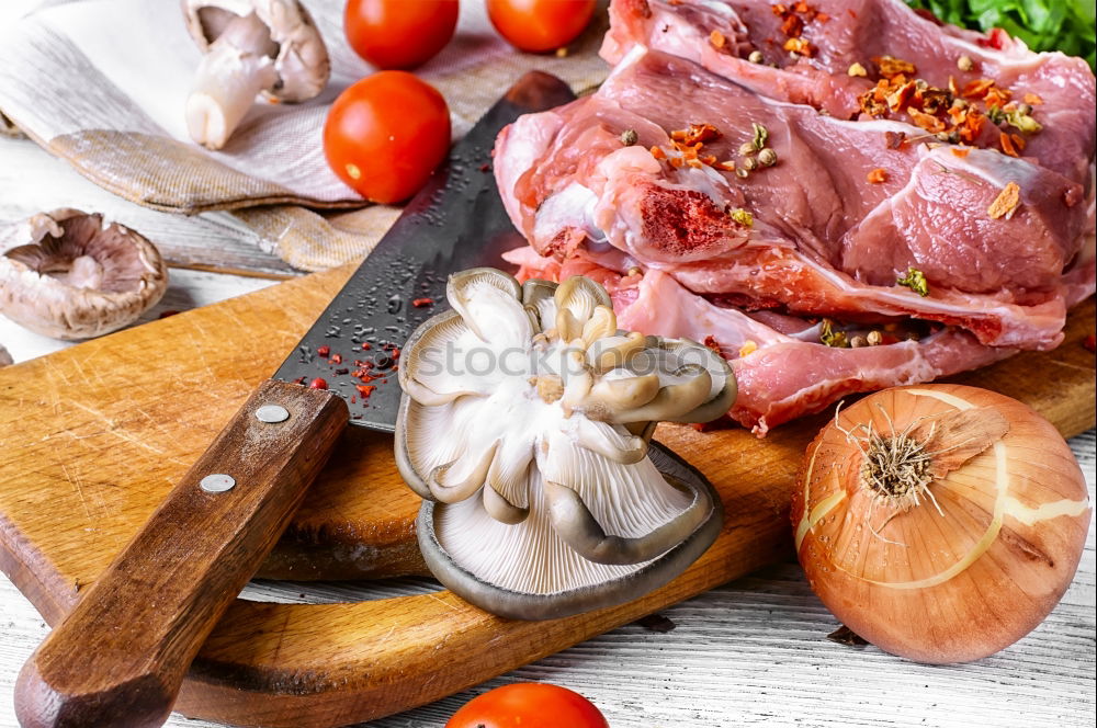 Similar – Image, Stock Photo Beef, vegetable ingredients, kitchen knife and saucepan