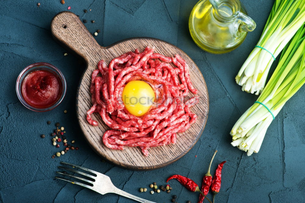 Similar – minced meat in an old mincer with herbs and spices