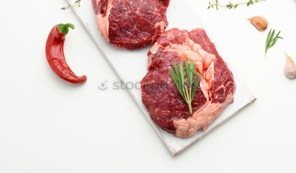 Similar – Image, Stock Photo Lamb cutlet with oil and rosemary