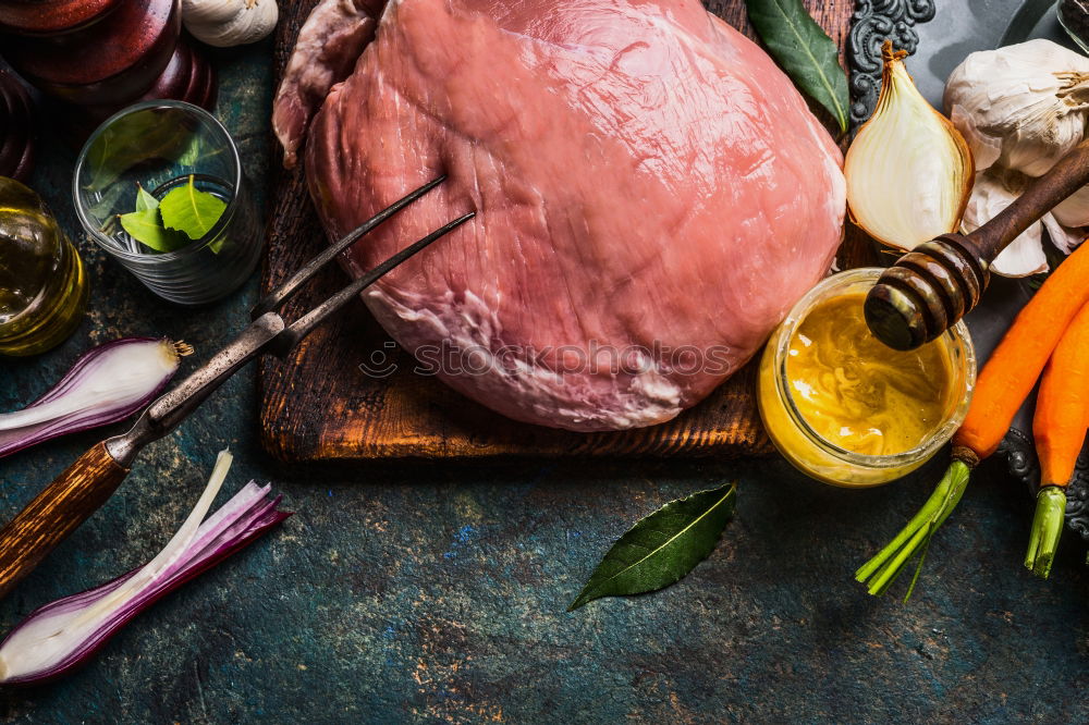 Similar – Cutting board background with meat ingredients