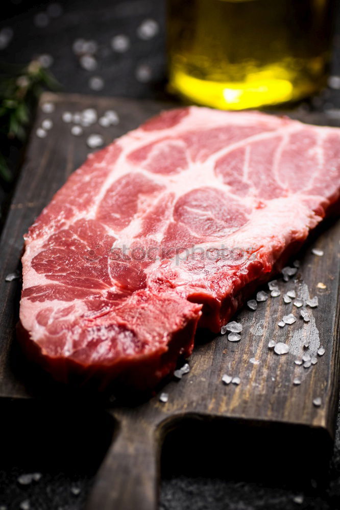 Similar – Image, Stock Photo Schnitzel meat on a rustic wooden table