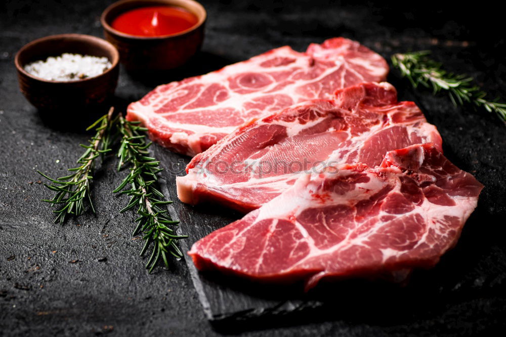 Similar – Knuckle of veal slices and ingredients for Osso Buco