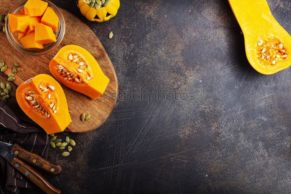 Similar – Image, Stock Photo Pieces of pumpkin in salt and pepper