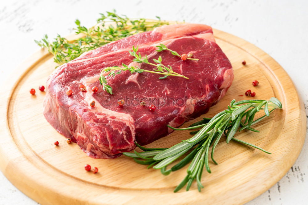 Image, Stock Photo Prepare steaks with herbs and butter