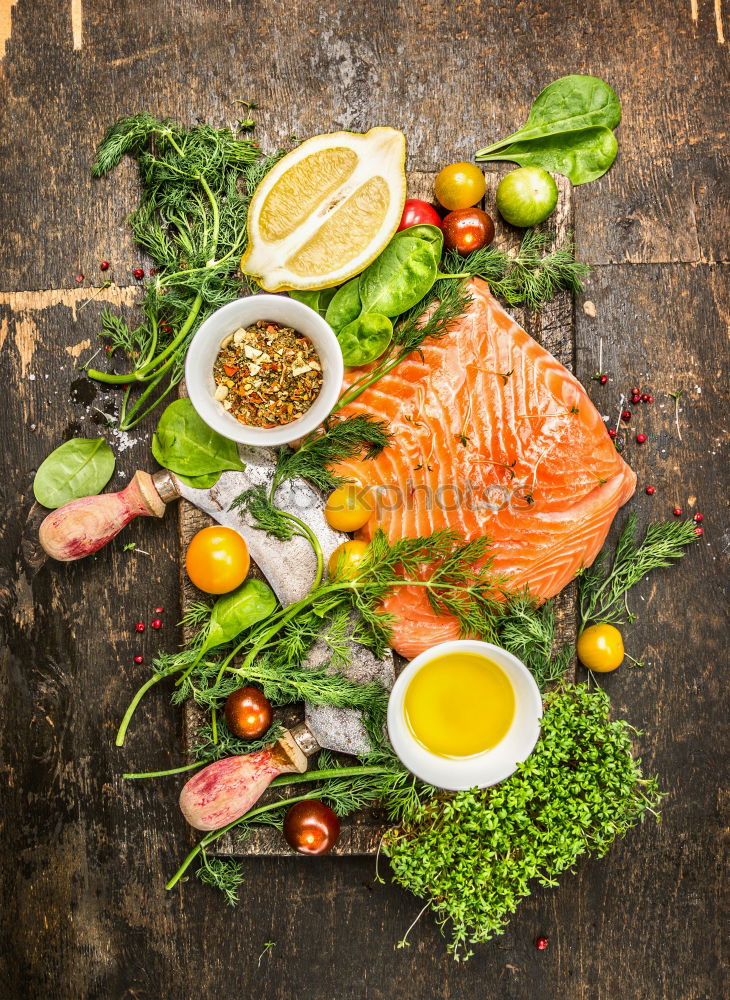 Similar – Image, Stock Photo Laschsfilet with fork and fresh ingredients for cooking