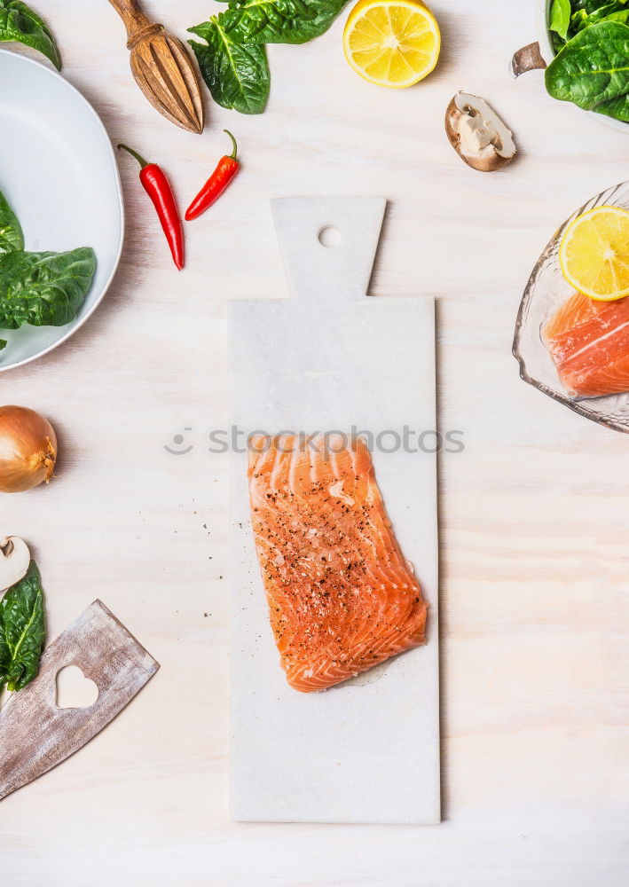 Similar – Image, Stock Photo Salmon fillet on cutting board with knife