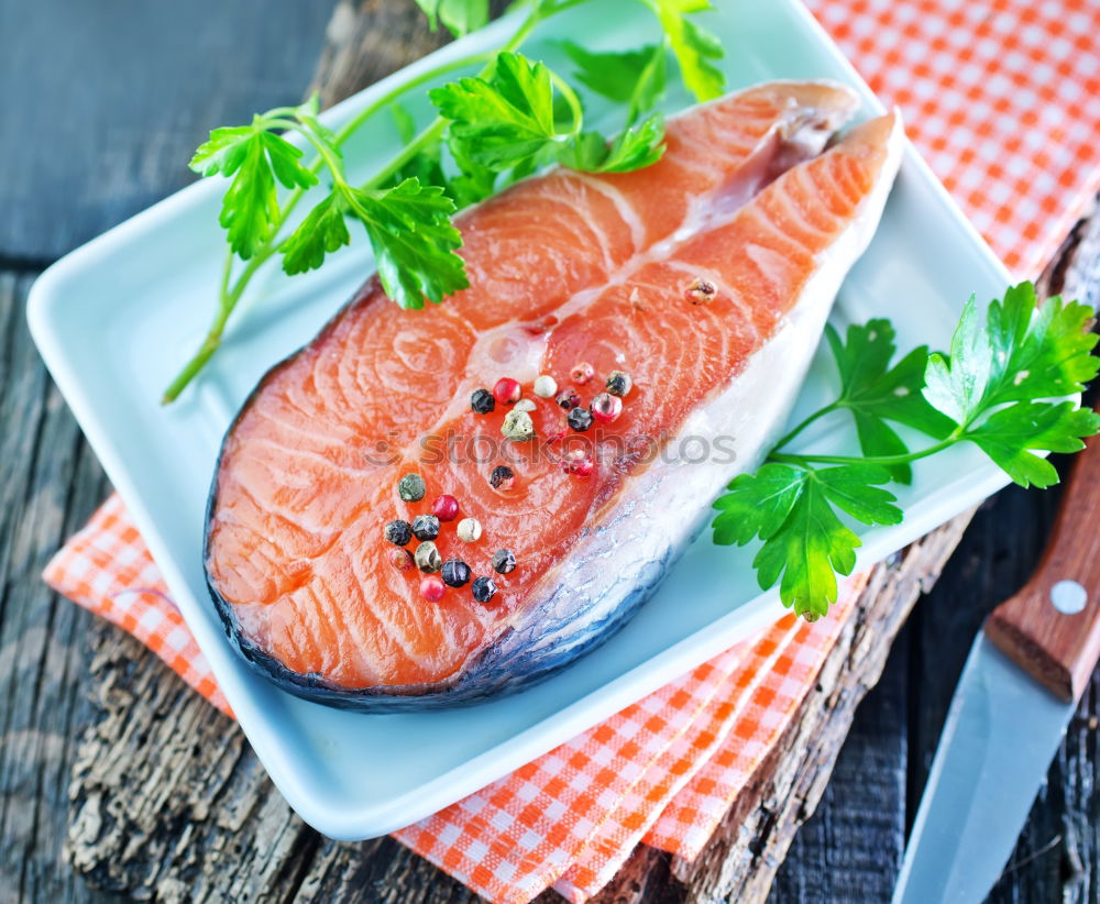 Similar – Salmon fish fillet with lemon in bowl