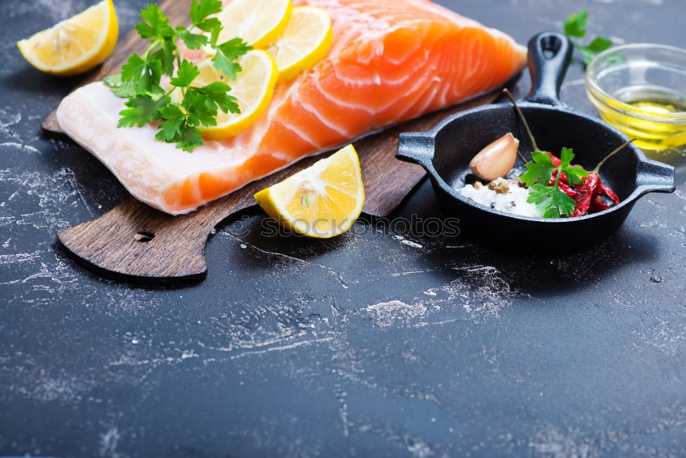 Similar – Image, Stock Photo Salmon fish fillet with lemon on white chopping board