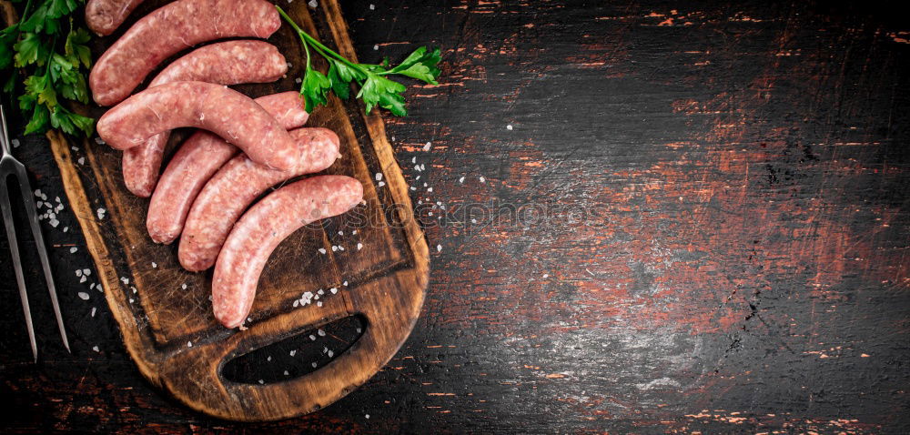 Similar – Image, Stock Photo Racks of lamb and green peas, preparation with cooking ingredients