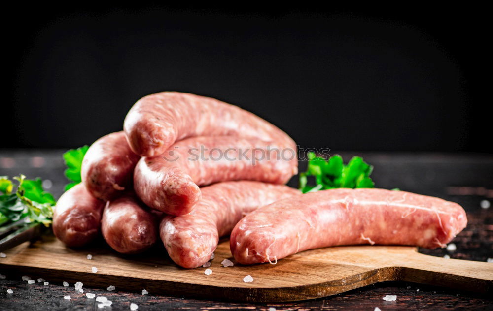 Similar – Image, Stock Photo Lamb Racks on kitchen table with green ingredients