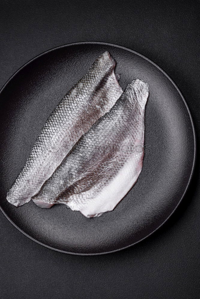 Similar – Image, Stock Photo Trout fish fillet with fennel seeds and salt