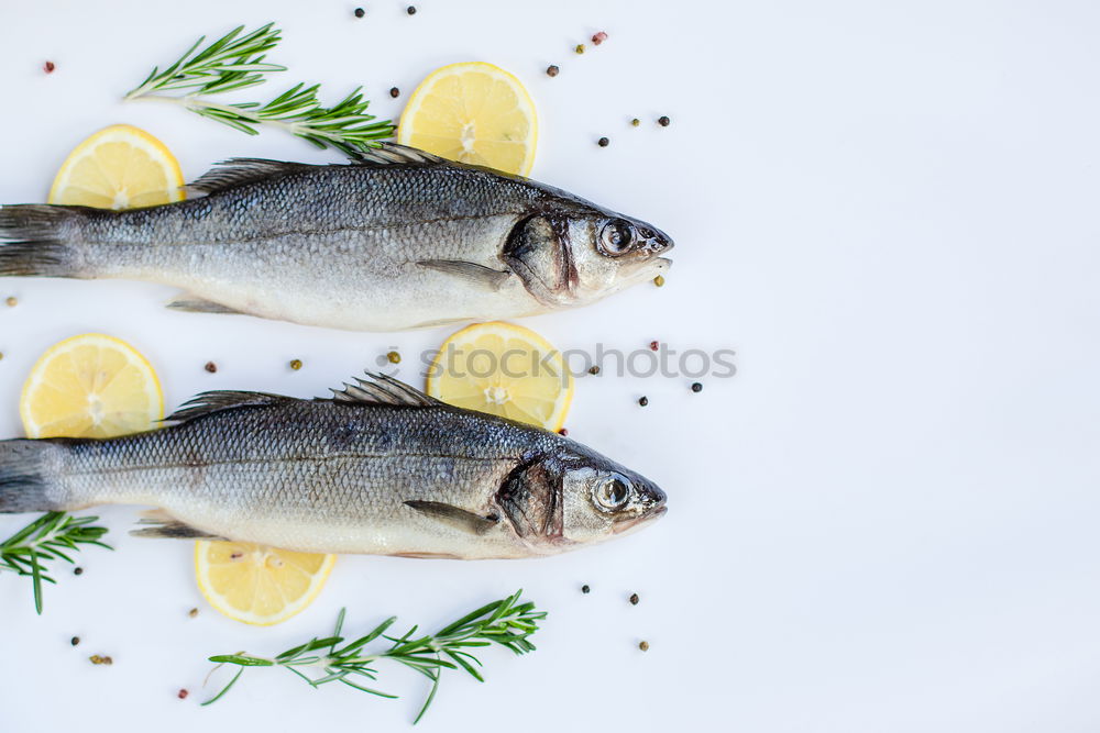 Similar – Prepare fresh fish with lemon and oil